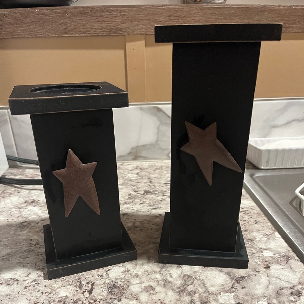 Primitive wooden candle pillars